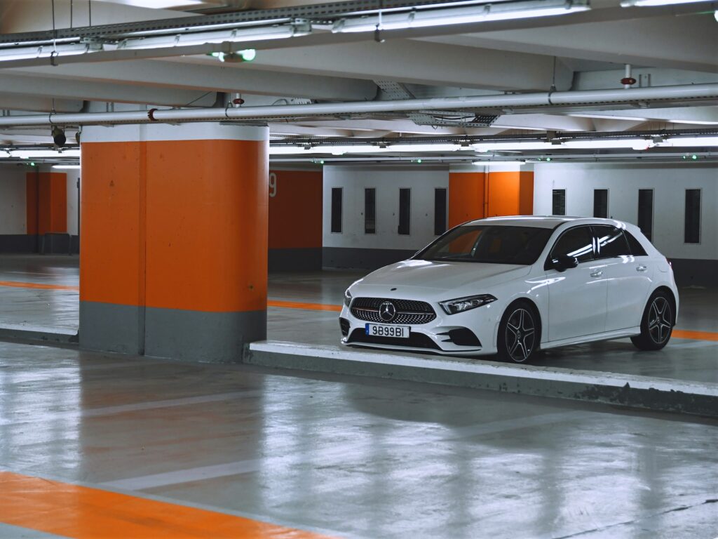 white bmw m 3 parked in garage