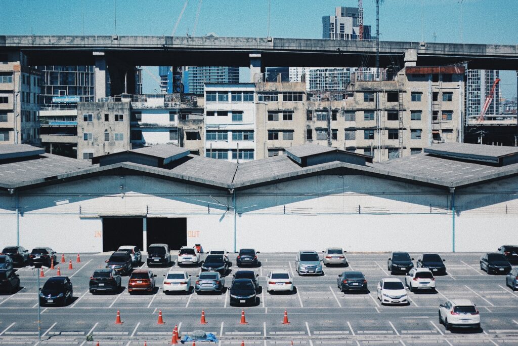 cars parked on parking lot during daytime